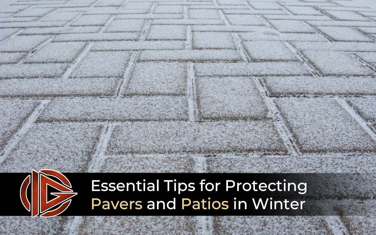 Cleaning pavers to remove debris and prepare for winter-proofing.